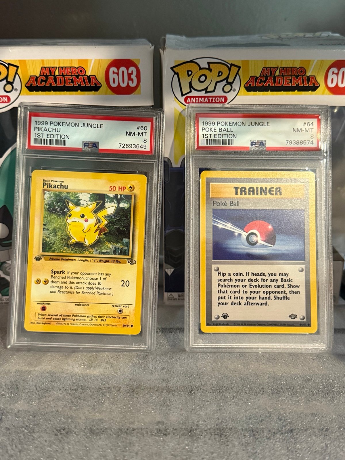 Pikachu 60 & Poke Ball 64 PSA 8