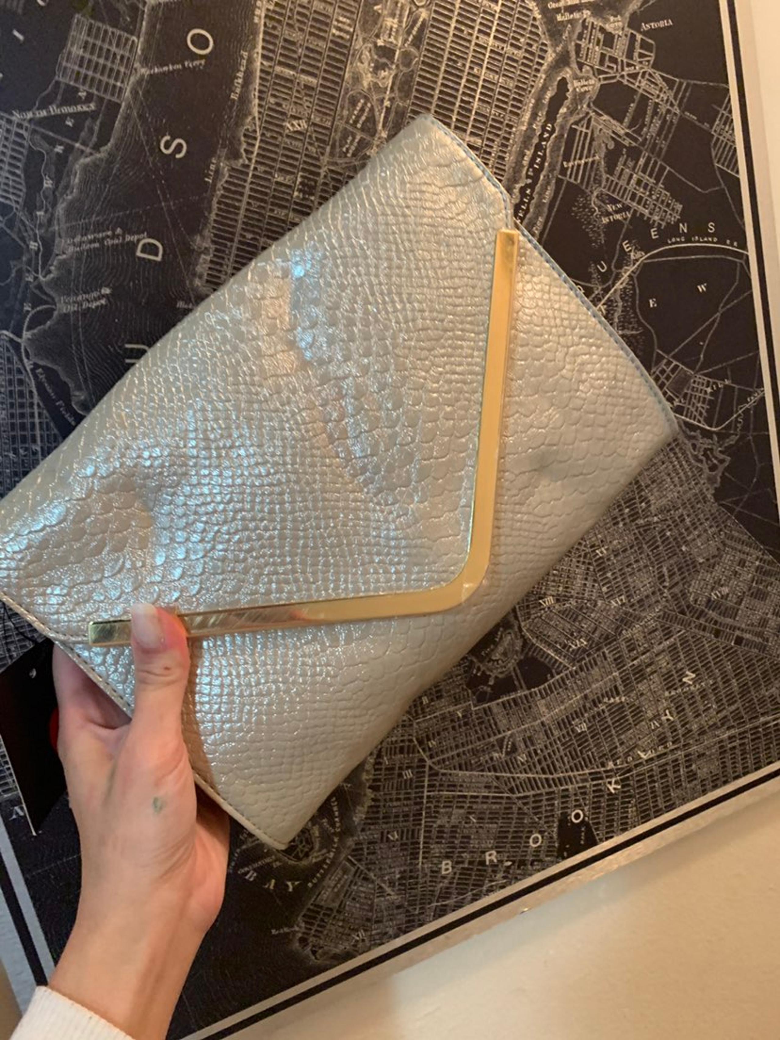 Guess silver clutch