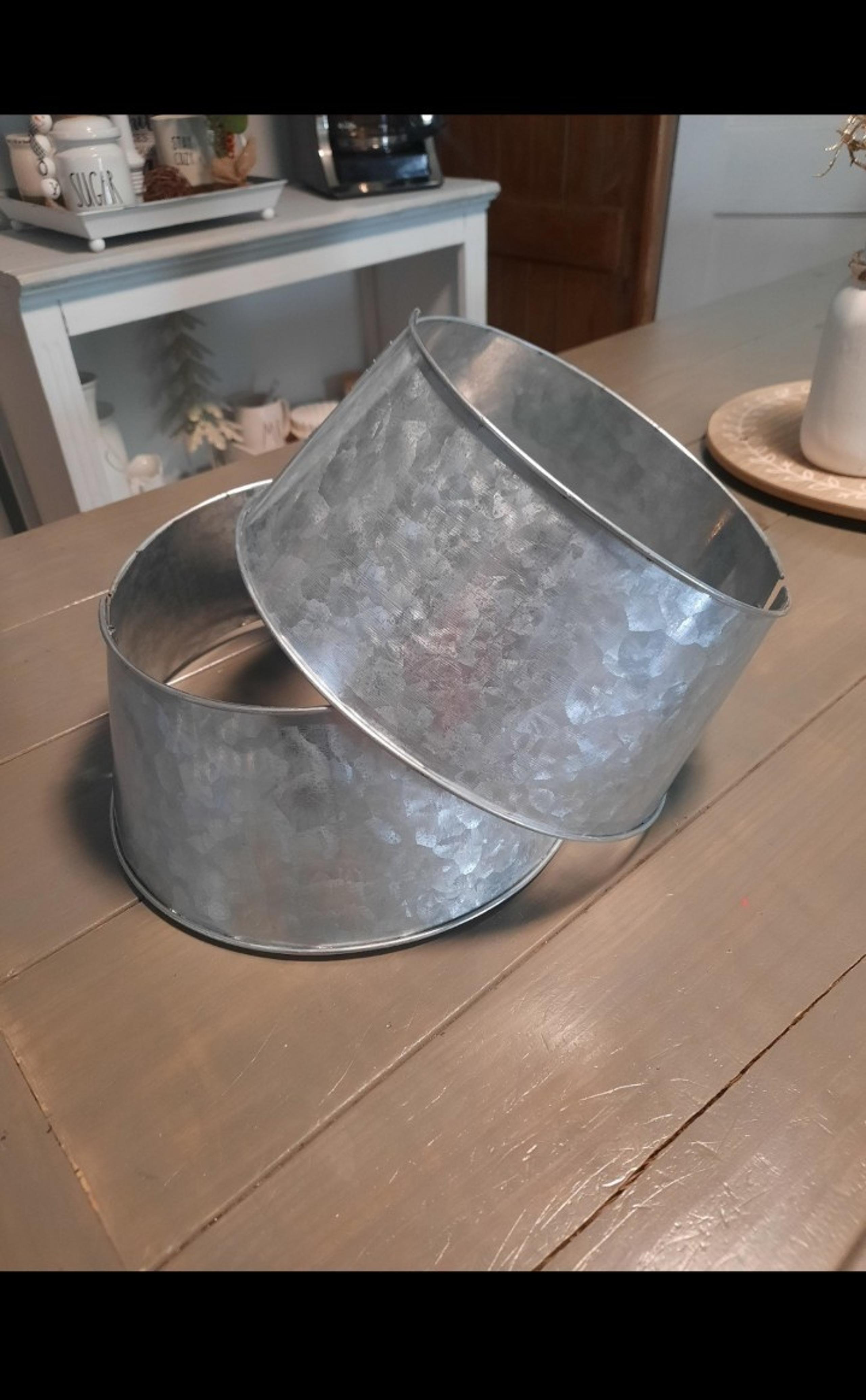 2 small galvanized Christmas tree collars