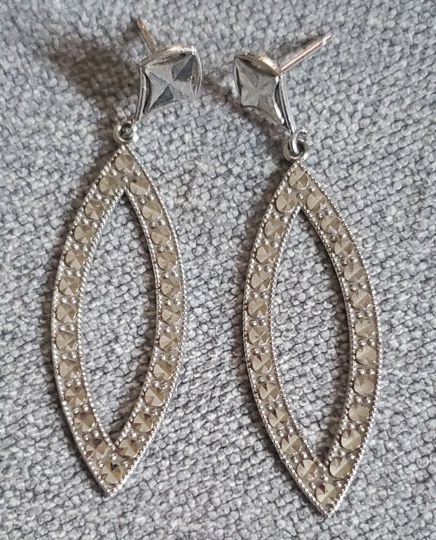 14 Karat White Gold Diamond Cut Dangle Earrings