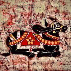 Batik wax resist painting of ornamented resting cow symbol of abundance & life