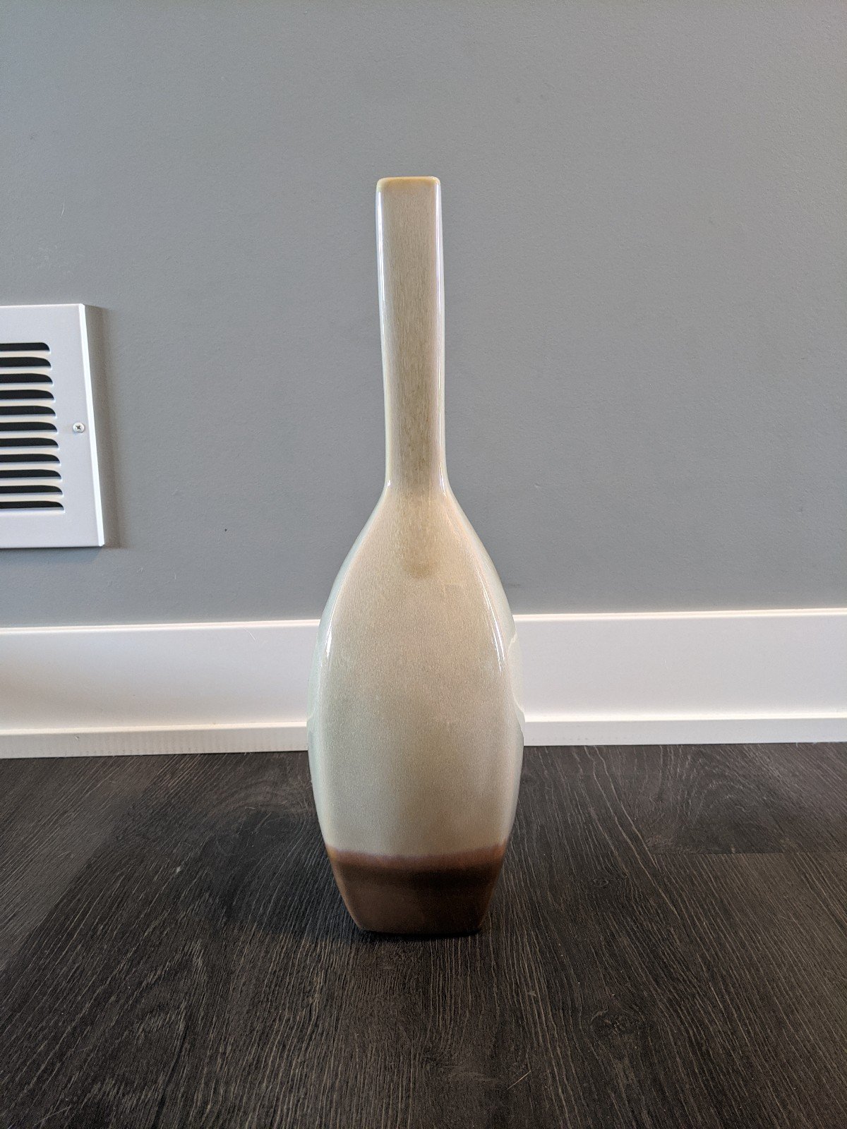 Cream and brown glazed bud vase