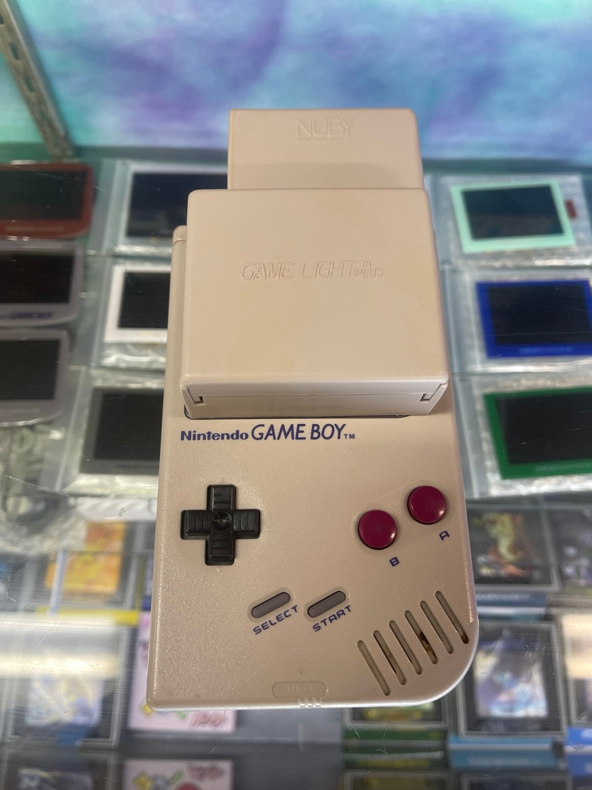 Nintendo gameboy with light up magnifier and speaker attachment