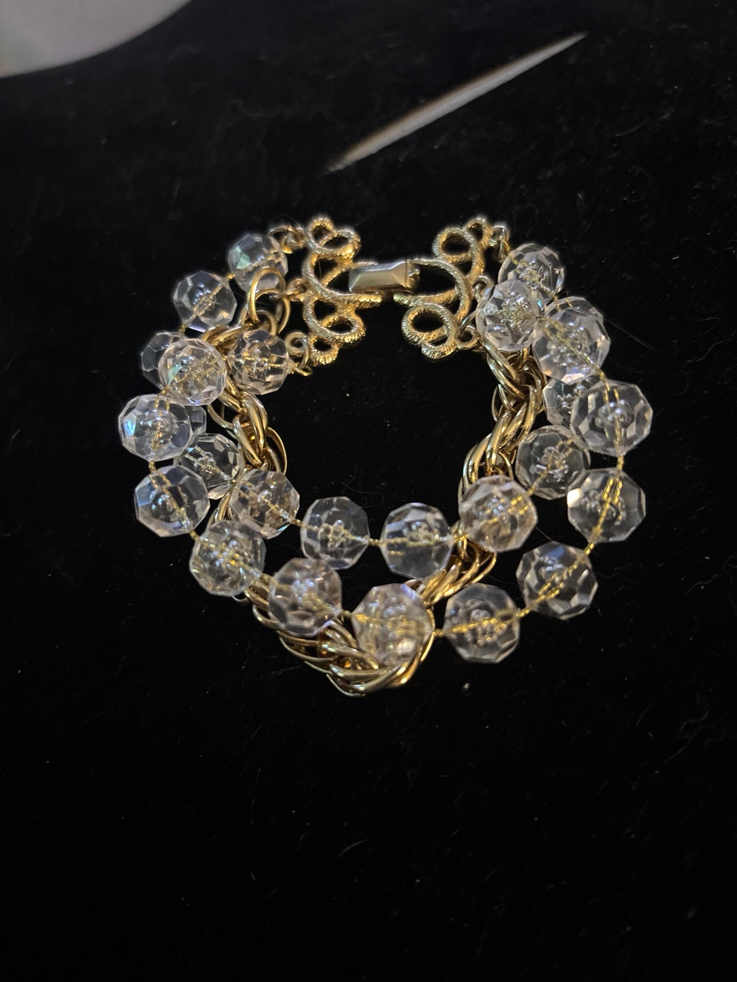 Bracelet marked Sarah Coventry gold tone with clear beads!
