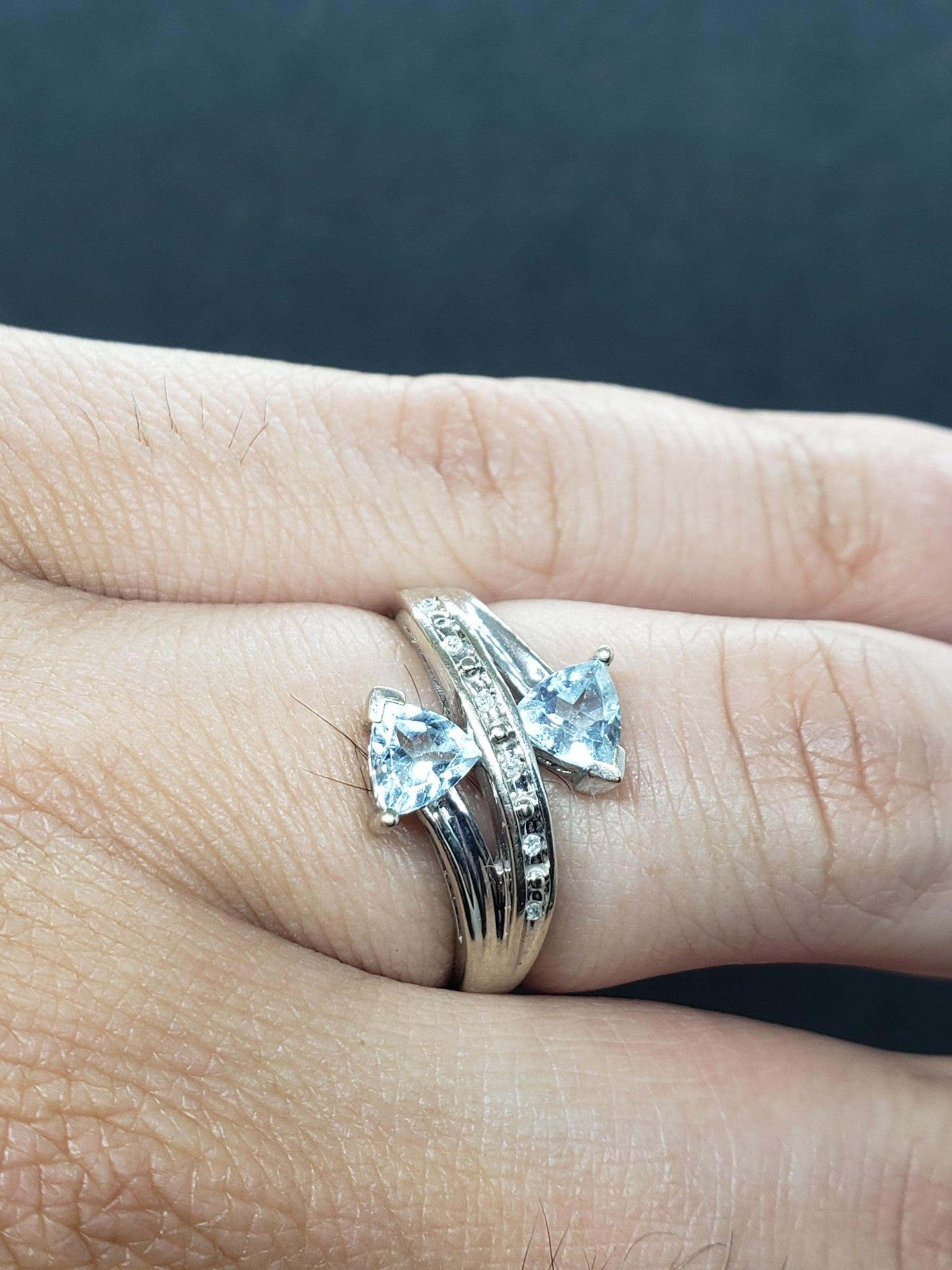 10k wg aquamarine and diamond bypass ring