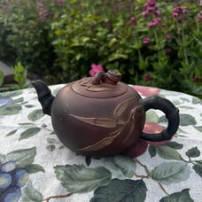 Chinese vintage handmade clay teapot with bamboo handle