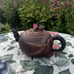 Chinese vintage handmade clay teapot with bamboo handle