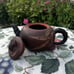 Chinese vintage handmade clay teapot with bamboo handle