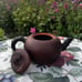 Chinese vintage handmade clay teapot with bamboo handle