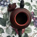 Chinese vintage handmade clay teapot with bamboo handle