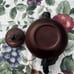 Chinese vintage handmade clay teapot with bamboo handle
