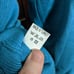 Benetti blue v-neck knit logo sweater