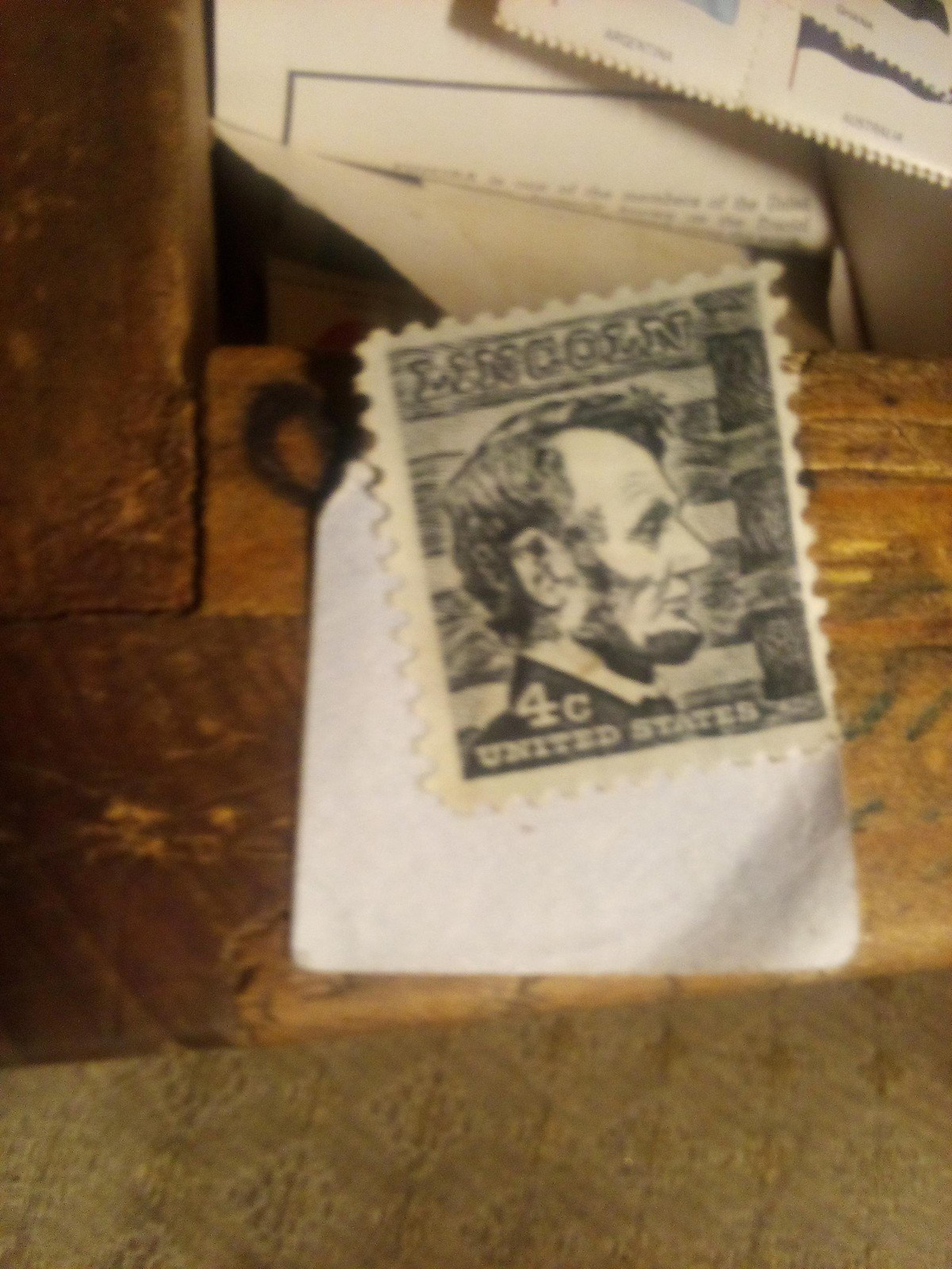 A 4 cent stamp of Lincoln black