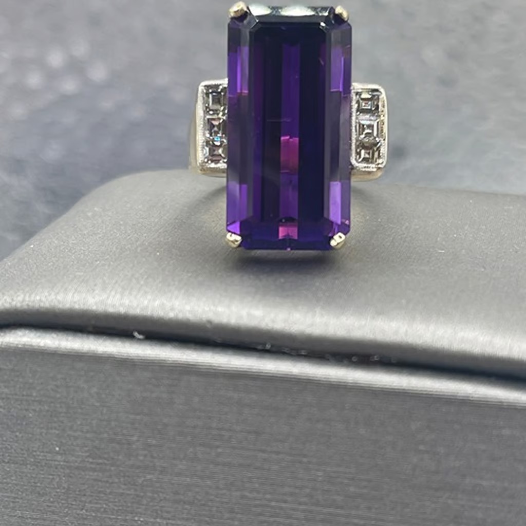 A Magnificent Ladies 14 Karat Gold Emerald Cut Amethyst & Diamond Ring