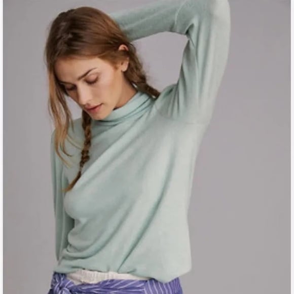 mint green turtleneck sweater