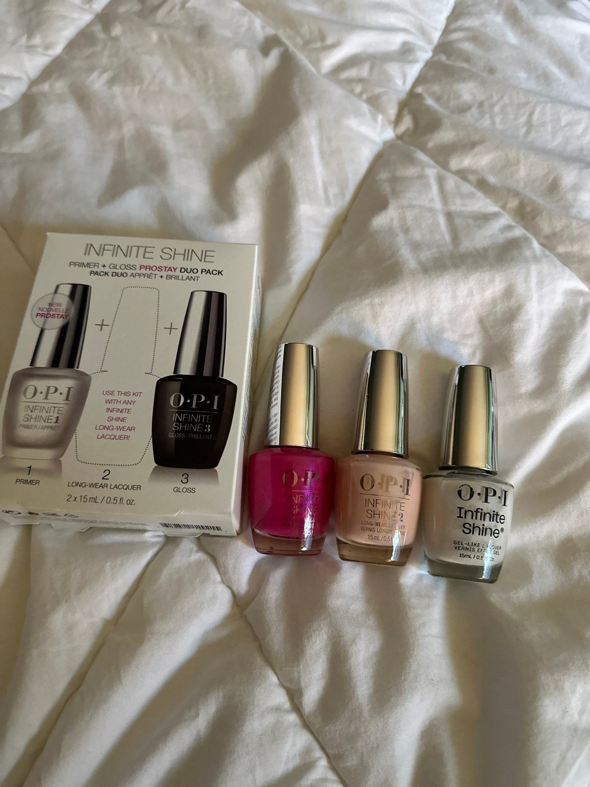 OPI nail infinite shine primer and gloss and comes with 3 polish
