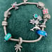 (Super Rare!) VTG Authentic 9 L Pandora Bracelet with twelve 925 Sterling Charms