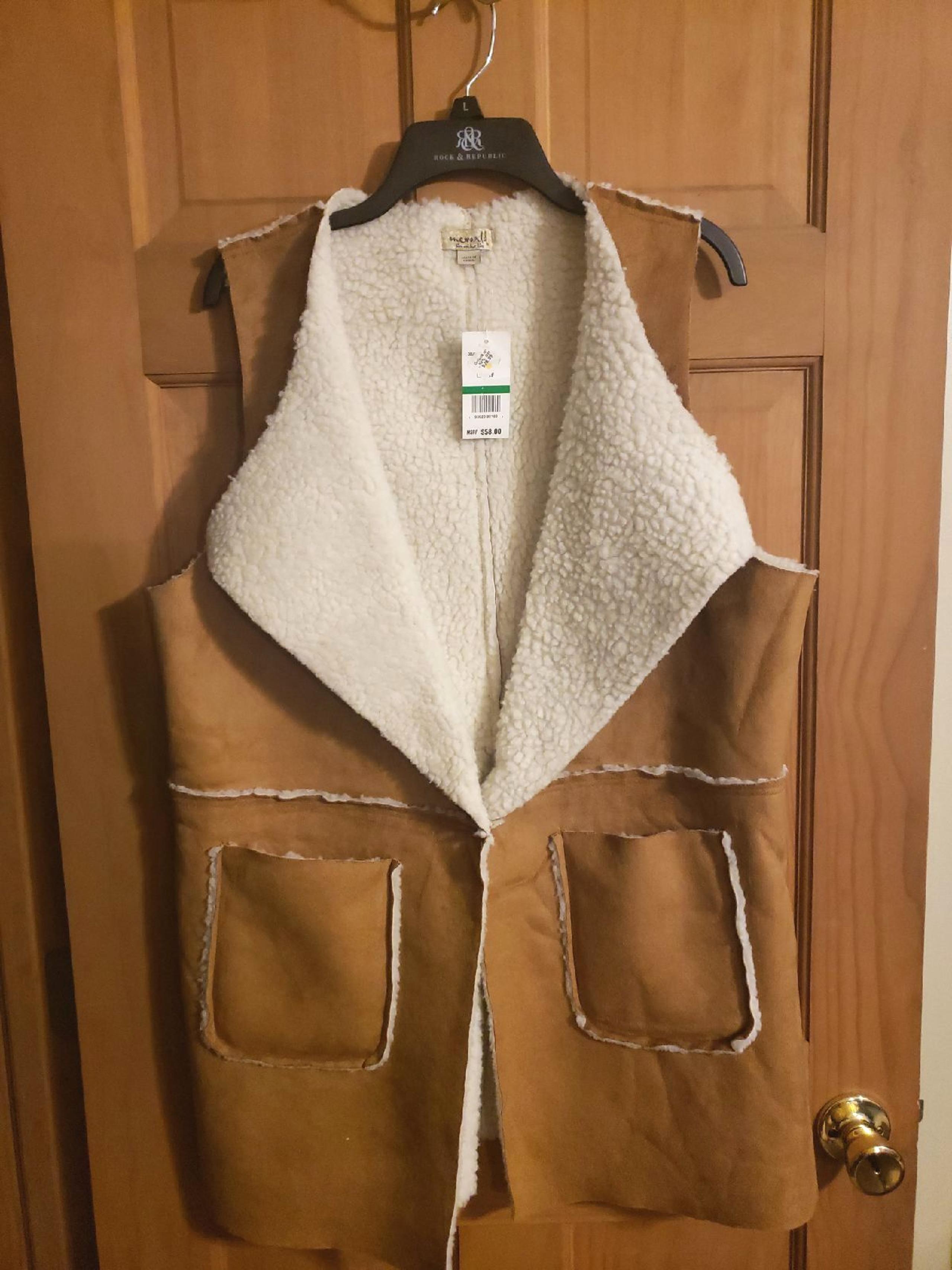 One World Fuzzy Vest