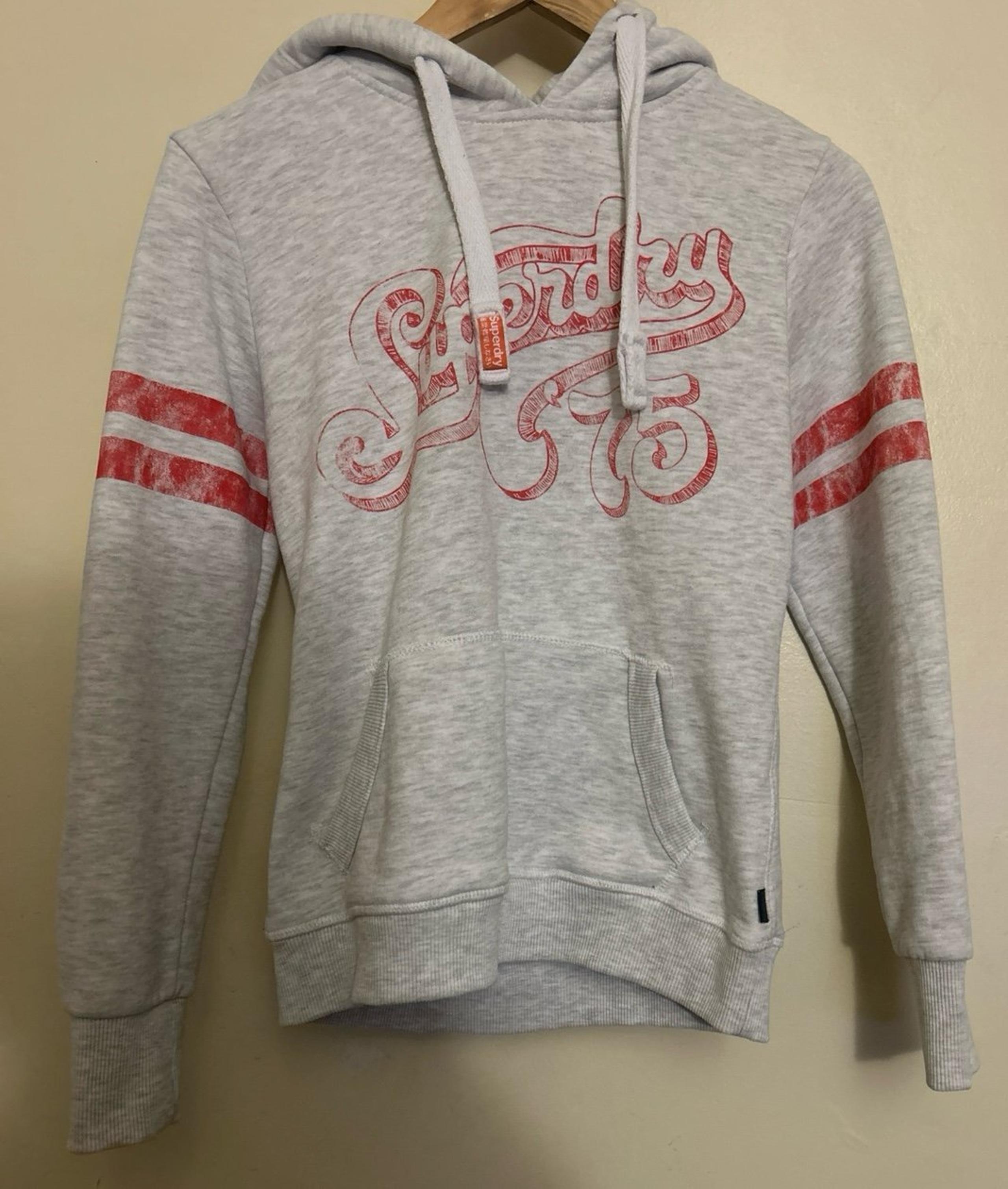 Super dry 75  Size 6 Hoodie  Gray with red strips.