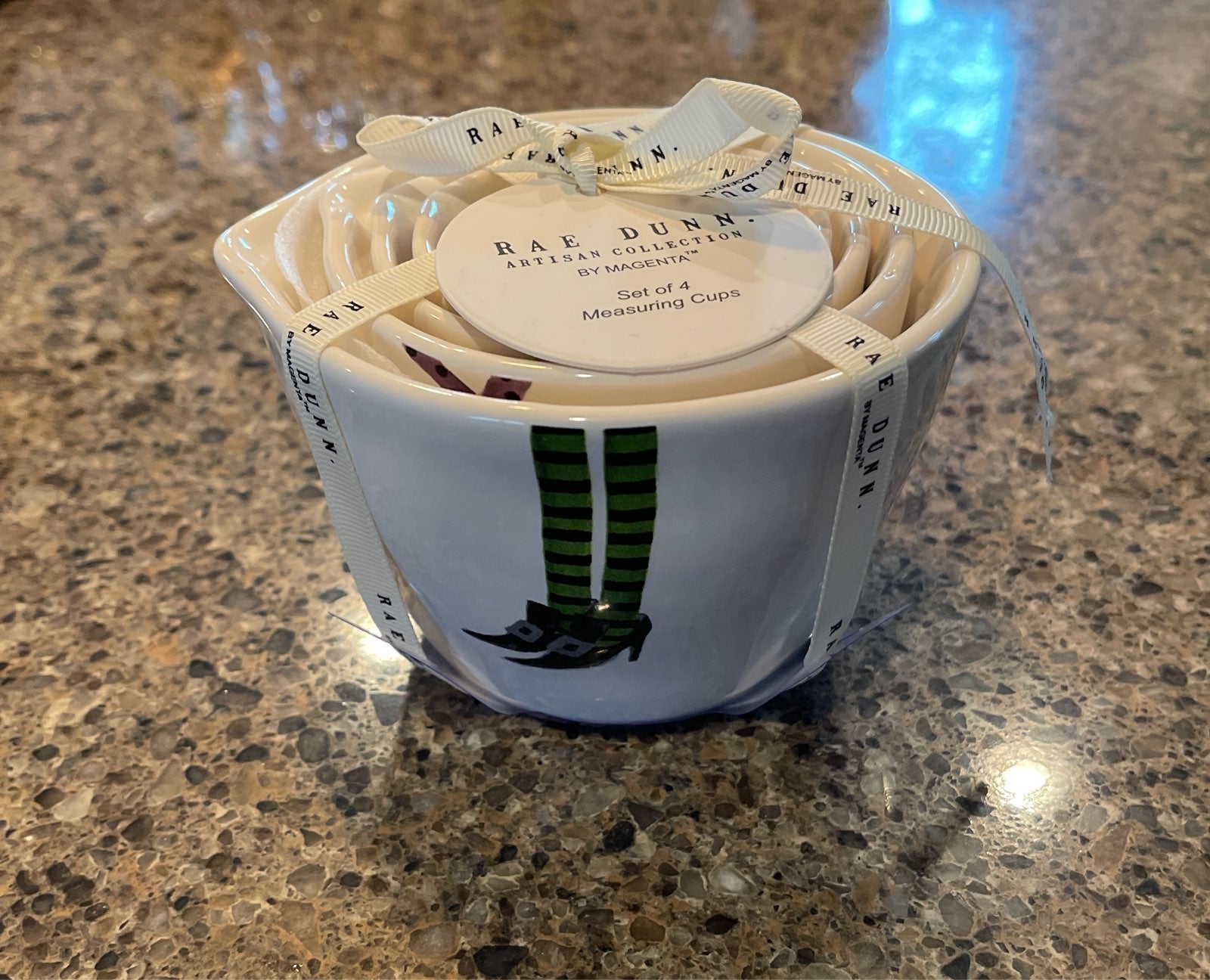 Rae Dunn witch feet measuring cups