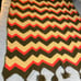 Vtg Retro 70’s Orange Tan Green Chevron Afghan Blanket W/Pom Poms 46”x76”