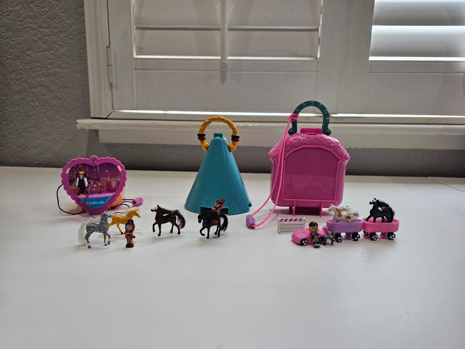 Includes 3 Polly Fakies - 2 are Happy Horses and one is a Cinderella Pendant