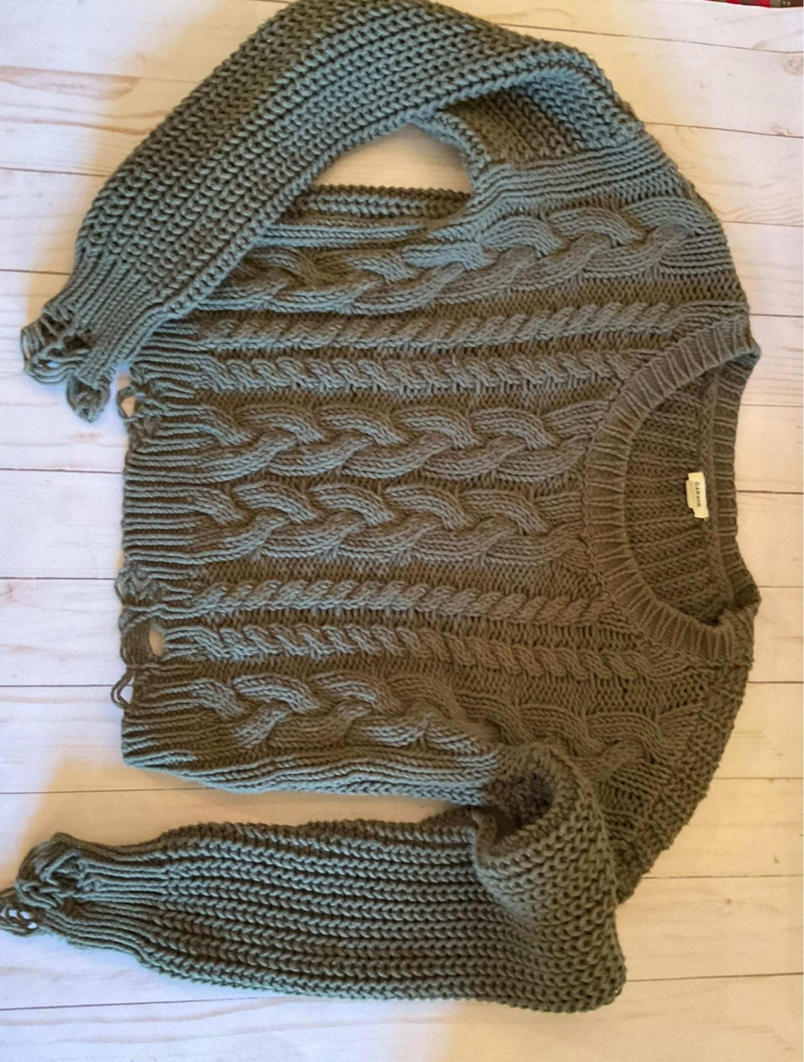 Garage distressed sweater
