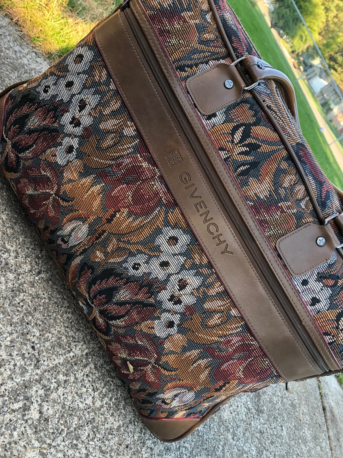 Givenchy floral duffle bag/suit case…