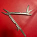 Vintage original Gerber Multitool with leather sheath