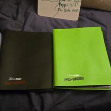 2 used plastic binders