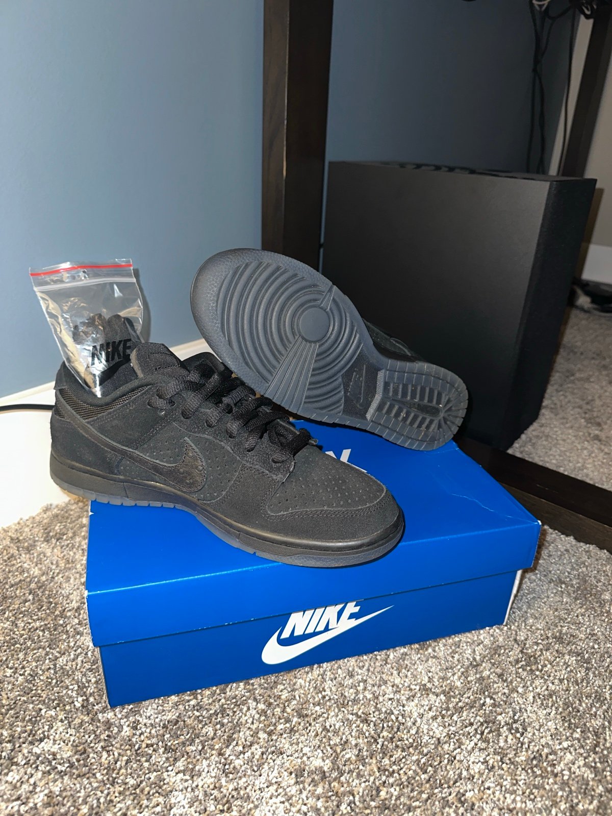 Undefeated black Air Force ones