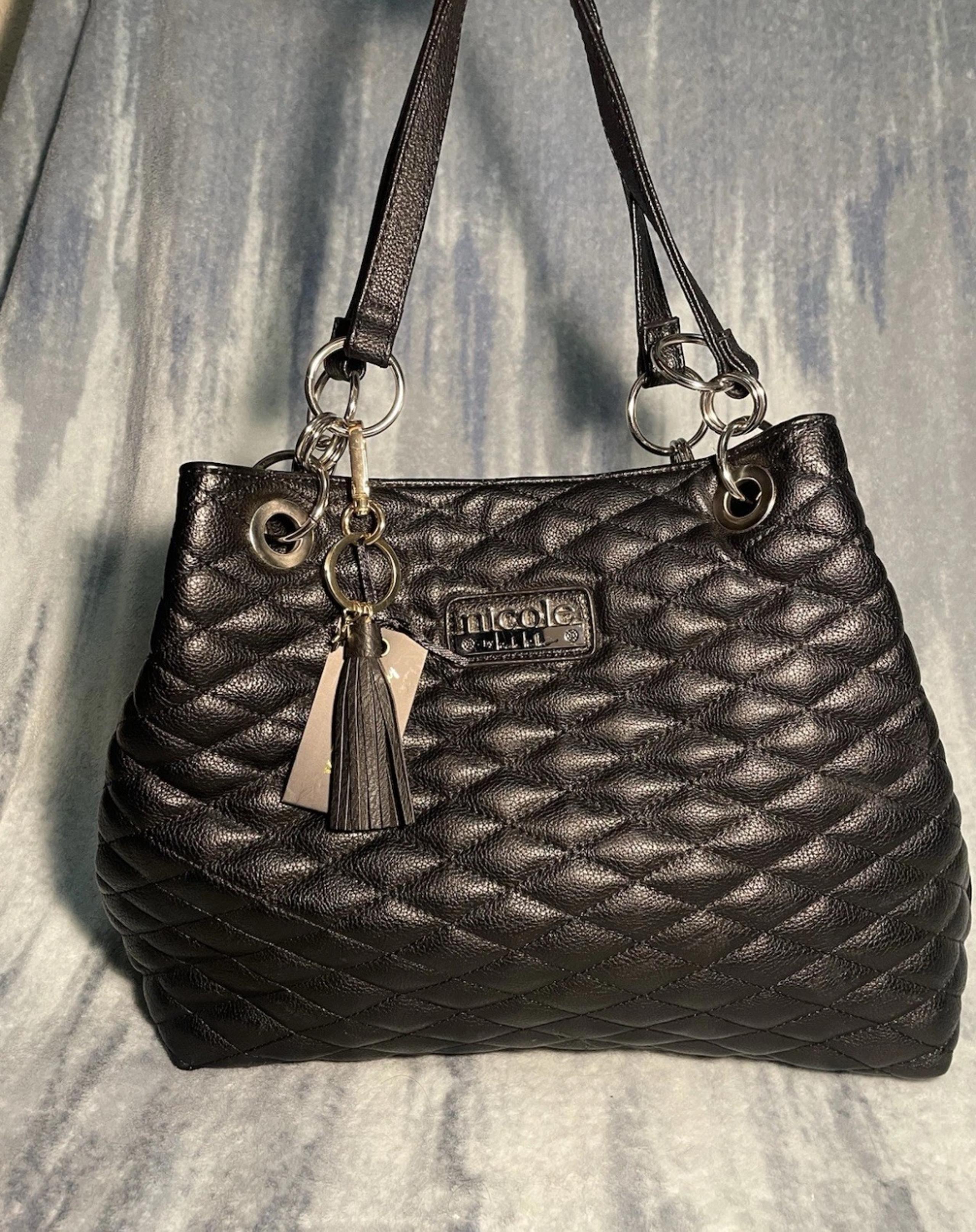 NICOLE MILLER Black faux leather handbag with bag charm