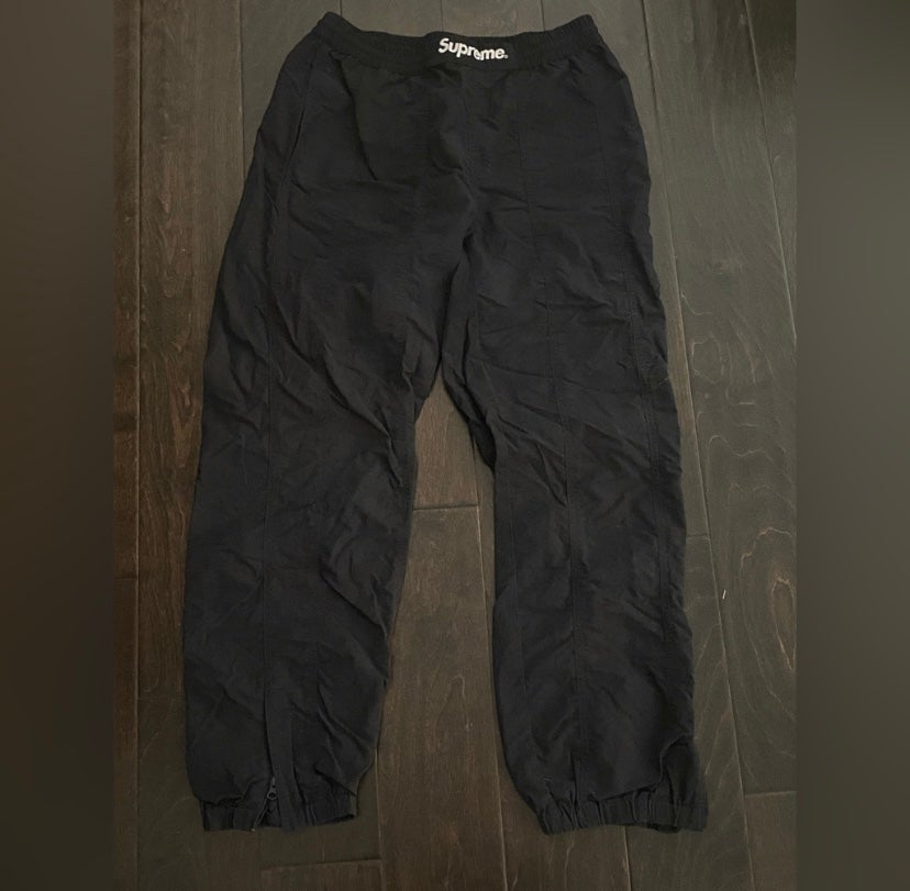 Black supreme paneled warm up pants