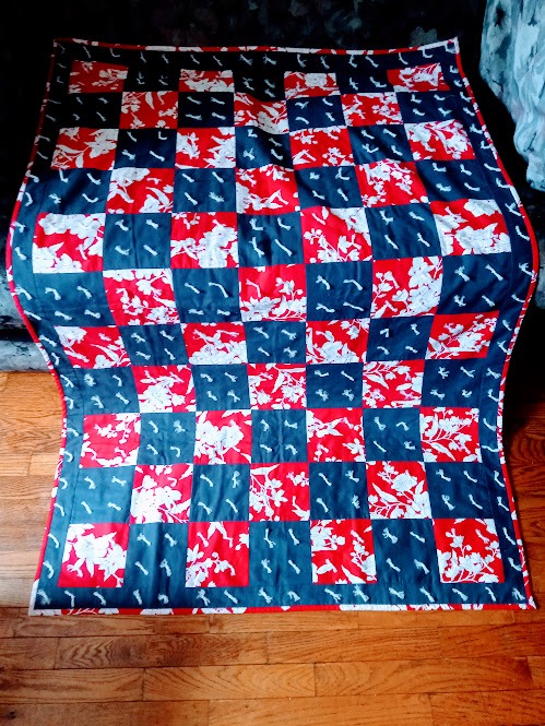 Vintage Red, White and Blue Panel Patterned Quilted Throw 41”x62”.
