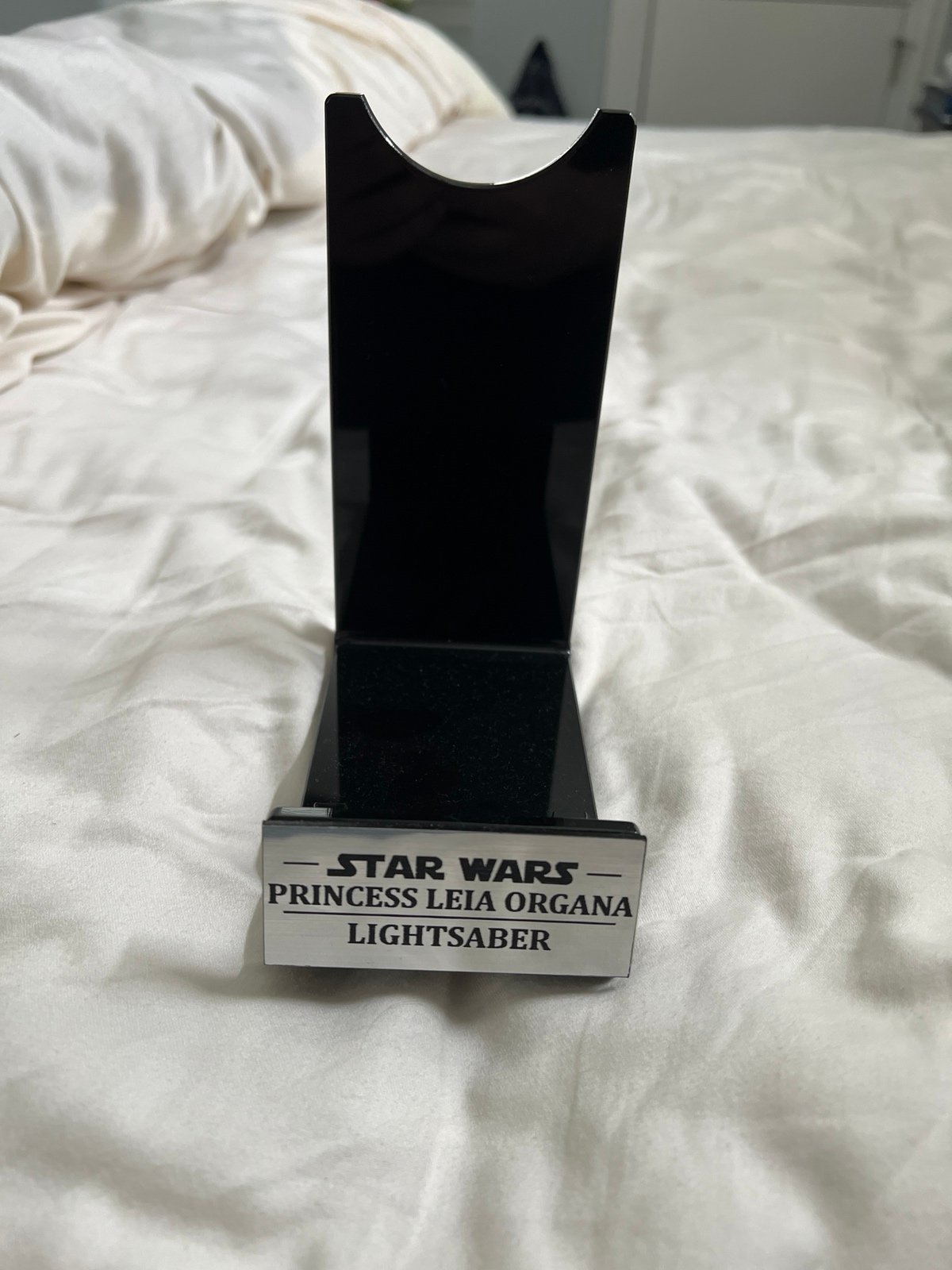 Disney Star Wars lightsaber display stand Princess Leia Organa NEW