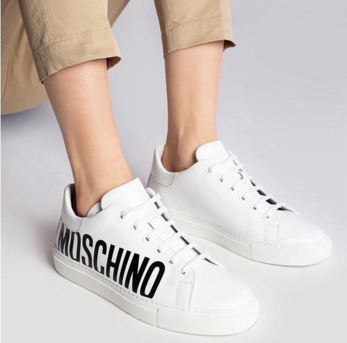 New Authentic Moschino Low-Top Logo Sneakers large contrast logo is printed