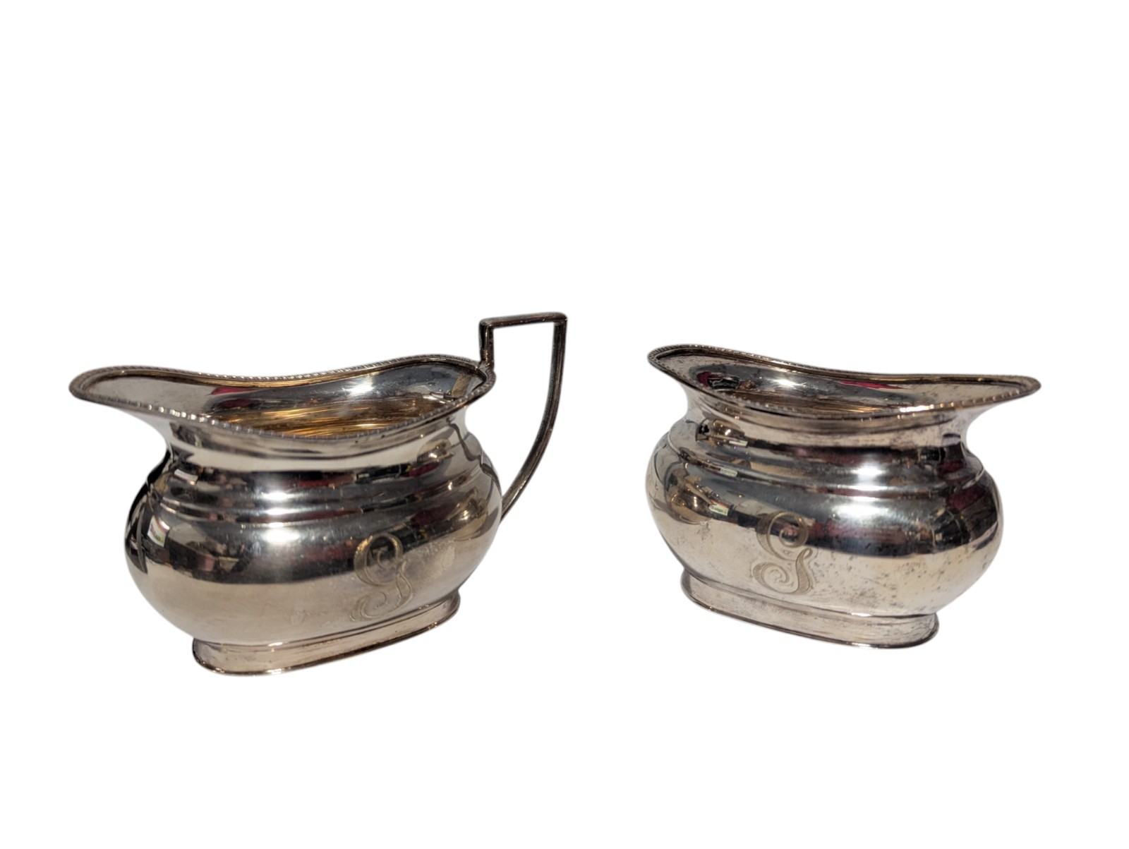 Vintage Cheltenham & Company Ltd English Ornate Silver Sugar & Milk jug Set.