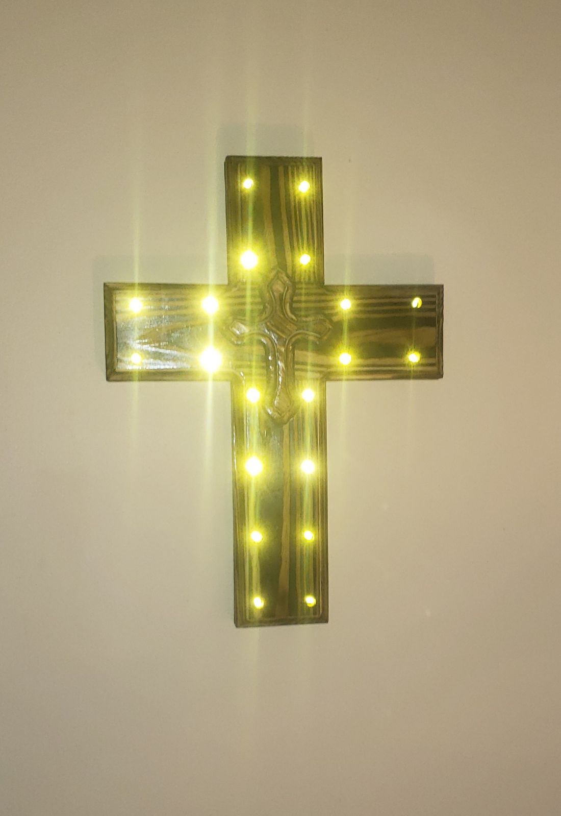 Wall Hanging cross with led battery operated lights .