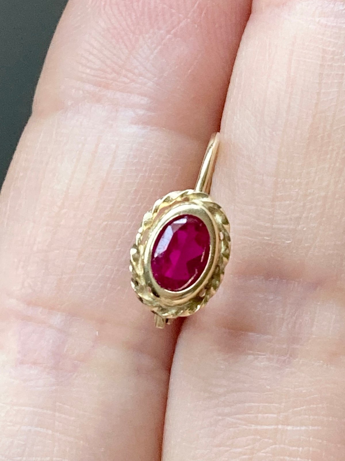 Single 14k yellow gold genuine ruby leverback earring