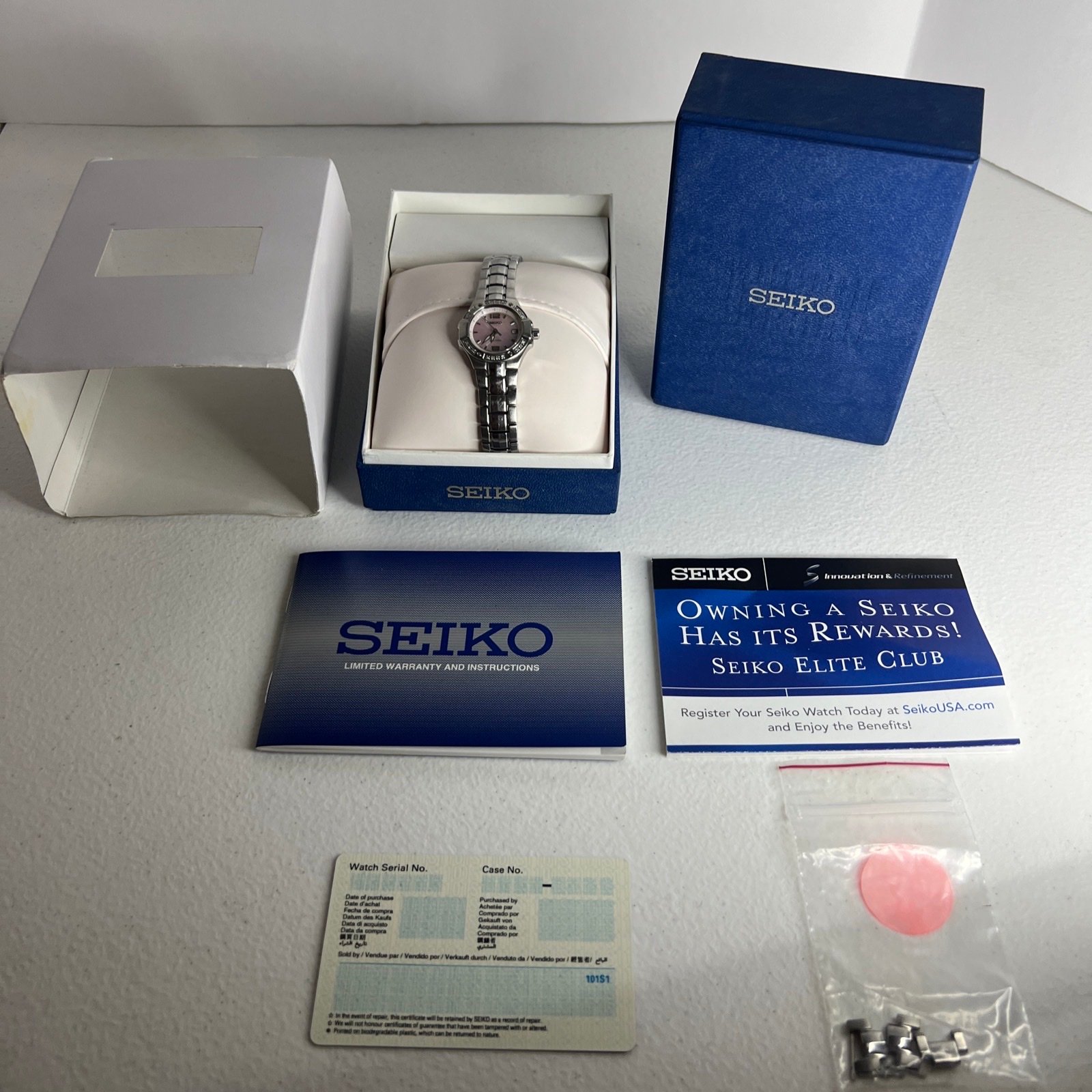 SEIKO Ladies COUTRA Light Pink Mother Of Pearl Diamond Bezel Stainless Watch