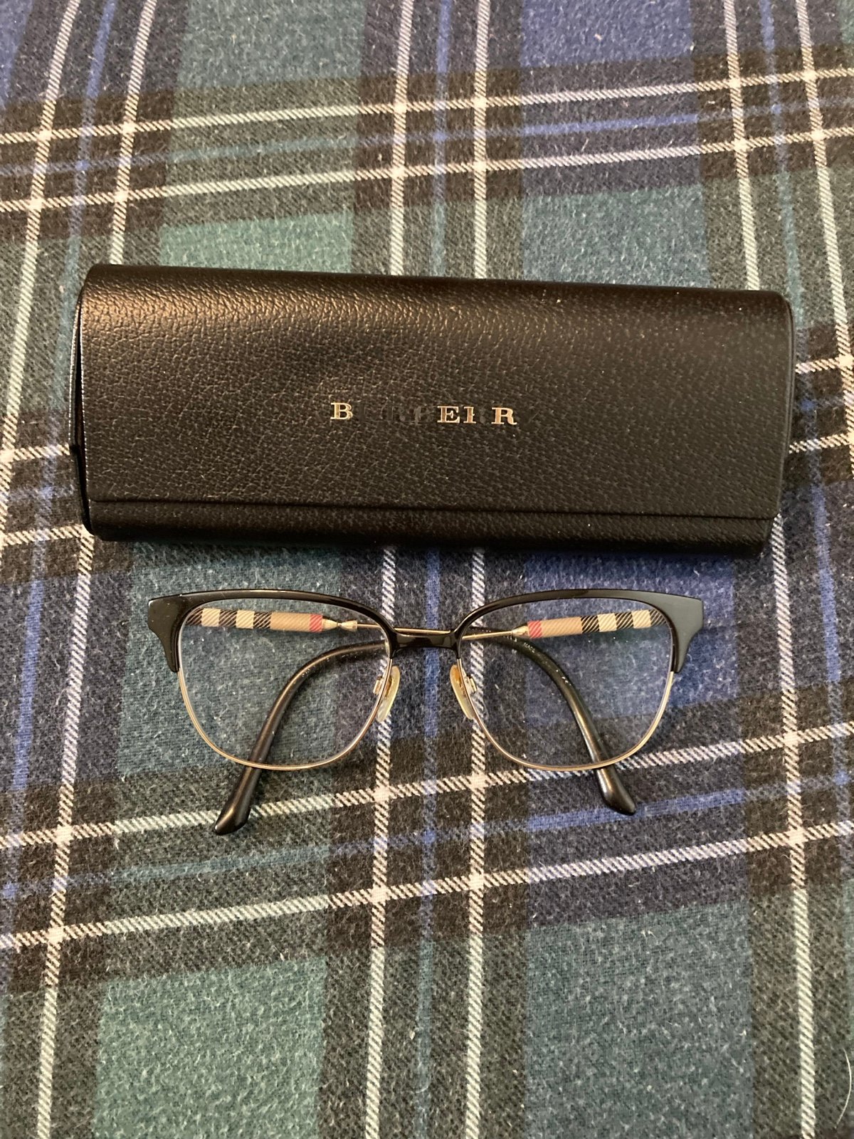 Women’s stainless steel BURBERRY glasses 53/16 with original black leather case.