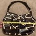 Cow print hobo bag