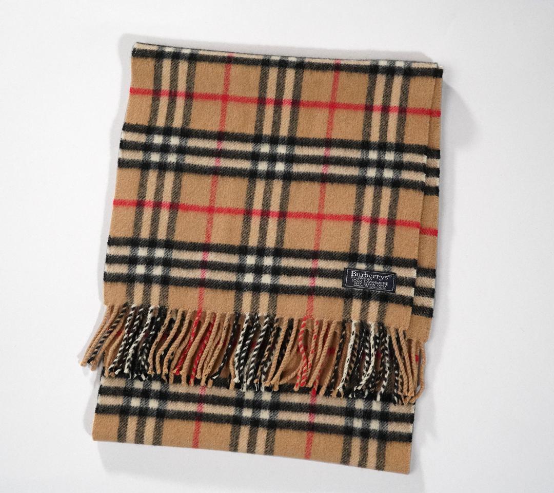 English-made Burberrys cashmere Nova check scarf with fringe.