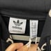 Adidas Originals 'Logomania' repeat logo zip hoodie in black size M
