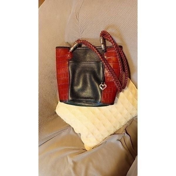 Brighton leather hand bag. Thick soft leather silver accent piece's. In black an