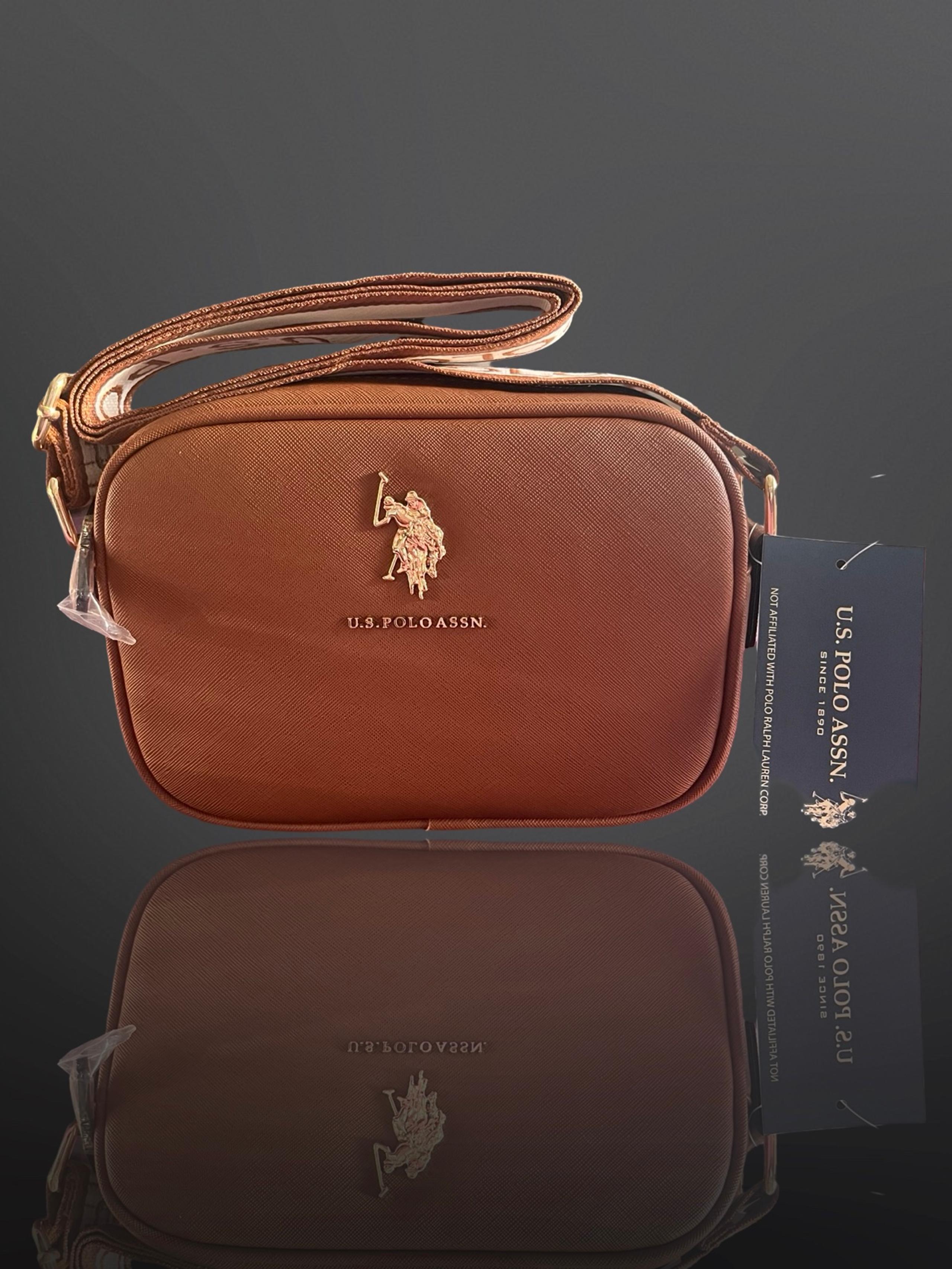 U.S Polo Assn. Classic Zip Crossbody Bag , Color Tan, perf for an everyday wear.