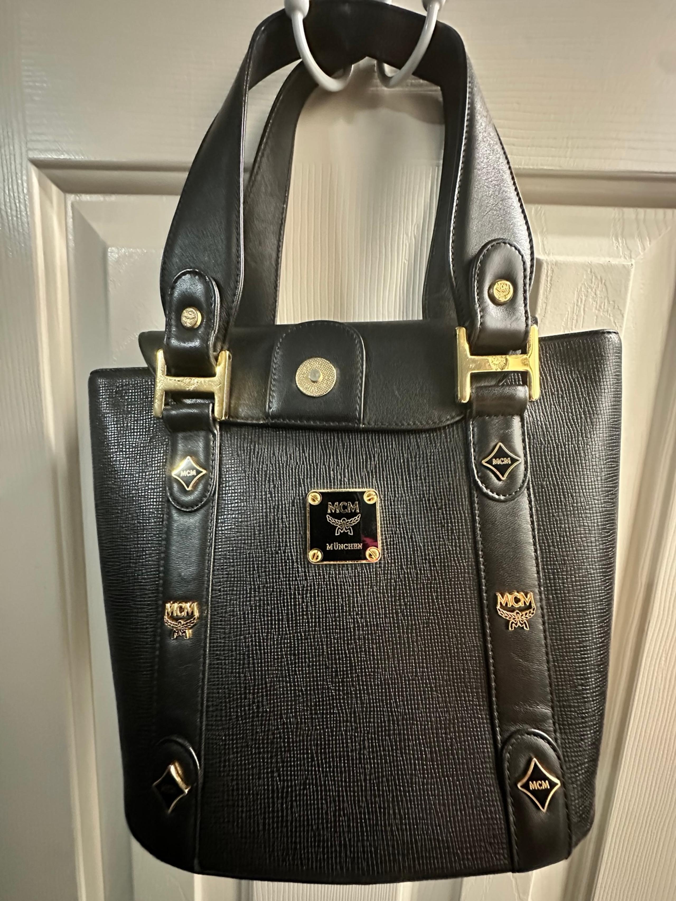 MCM authentic black leather hand bag