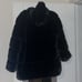 Black faux fur coat