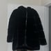Black faux fur coat