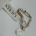 Lauren Ralph Lauren NWT Gold Silver Two Tone Logo Coin Flex Line Toggle Bracelet